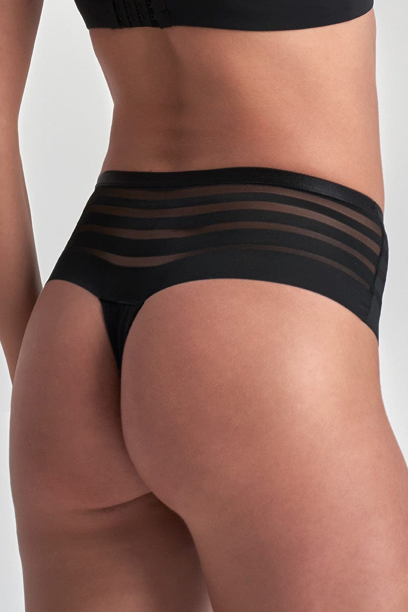 woman wearing Black high-waisted period Bye Bra boxerstring with mesh panels on a neutral background | Envie lingerie