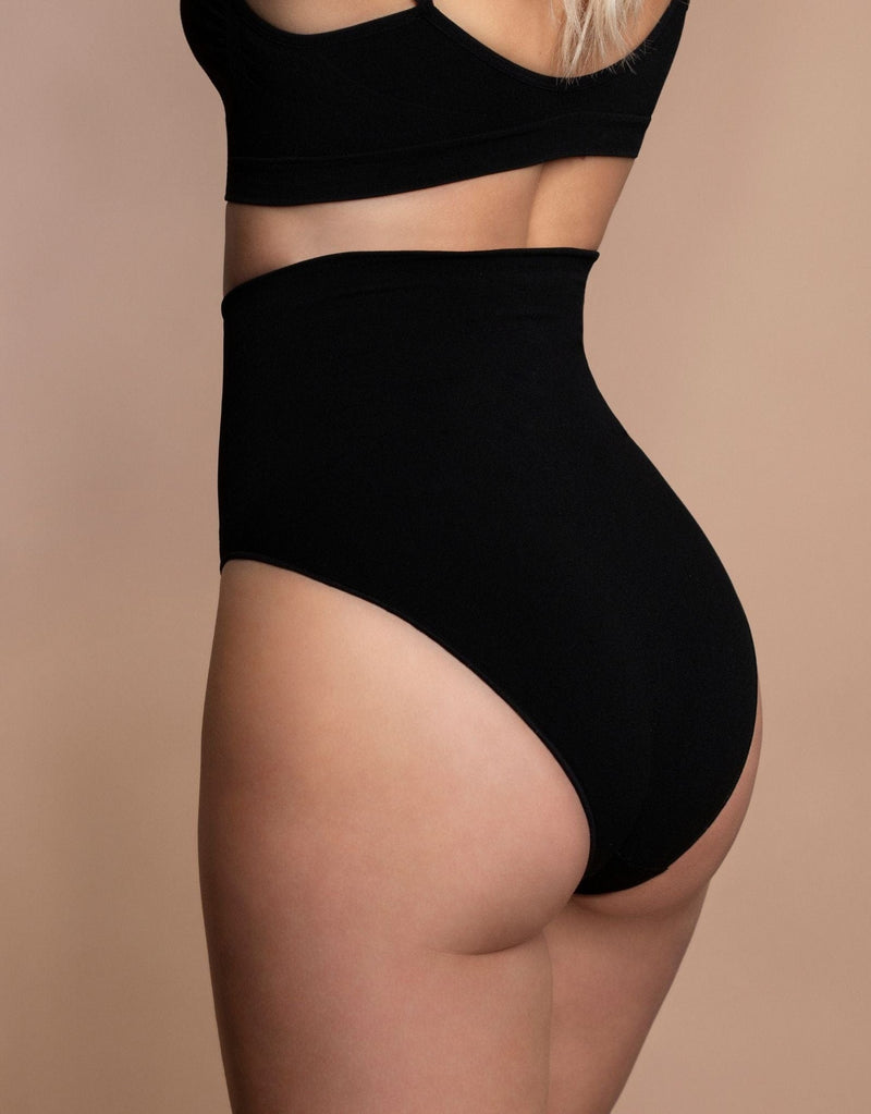 Woman wearing Bye Bra Seamless High Waist Brief in black howing Side View | EnVie lingerie