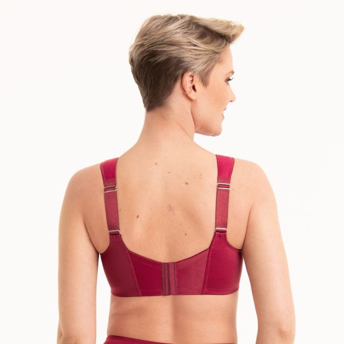 Back view of Woman wearing an Anita Havannah red bra on a white background