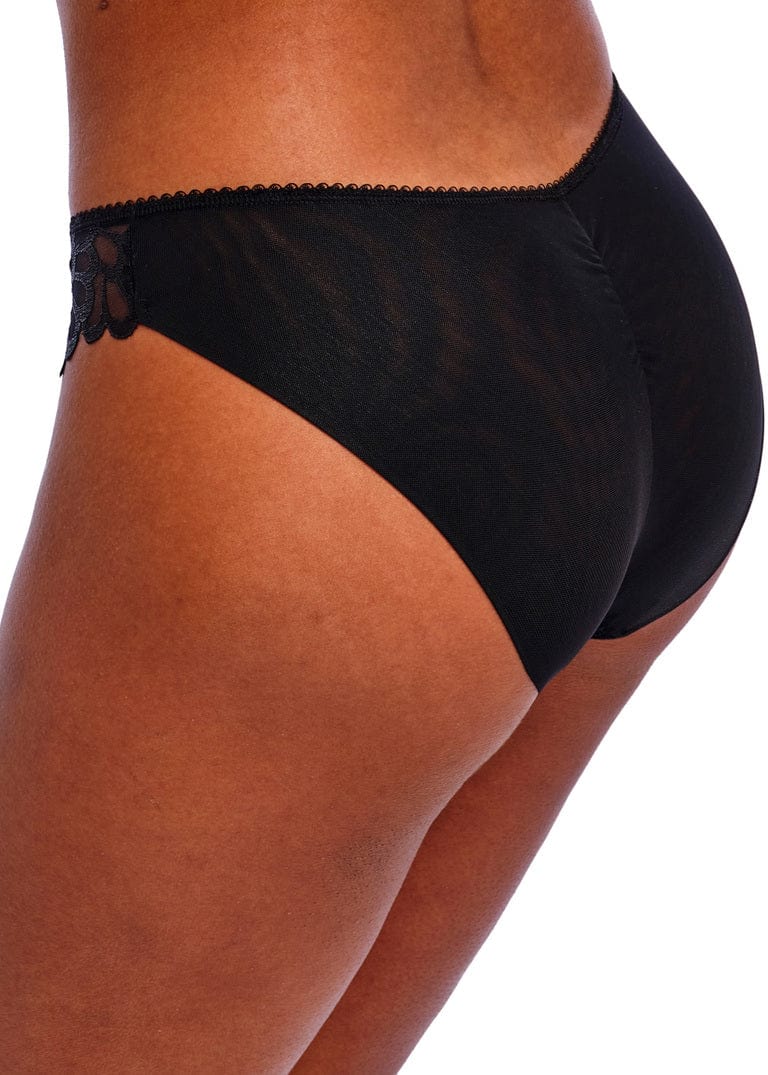 Wowman wearing Black Freya Loveland Brief underwear on a white background