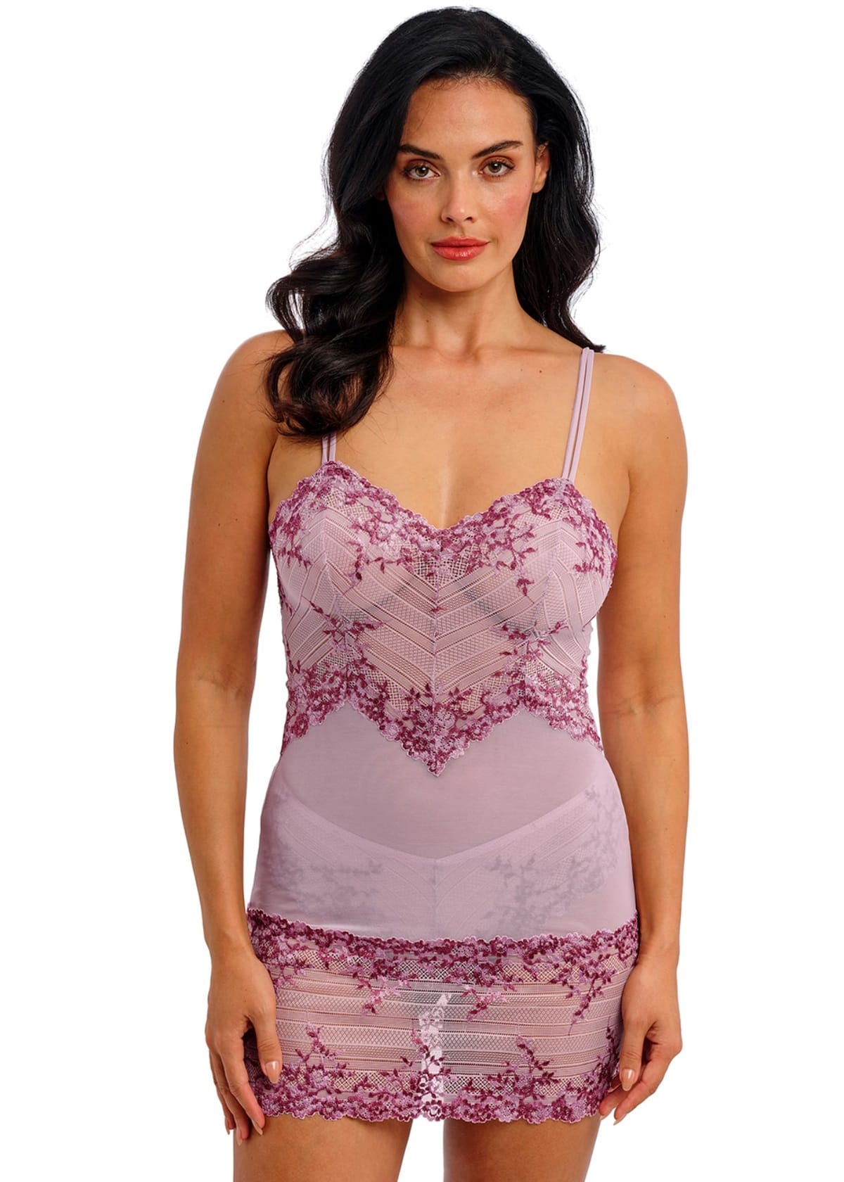 Woman wearing a purple lace nightgown on a white background