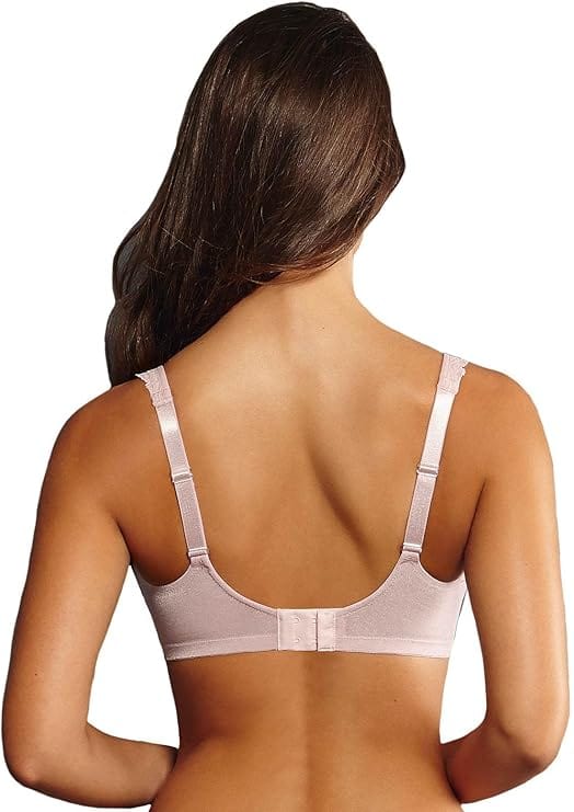 Woman wearing a Anita Selma Bra in rosewood with lightly padded cups on a white background