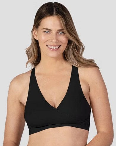Breastfeeding mom wearing Bravado! Sleep Bra with easy nursing access in black with crossover bra design