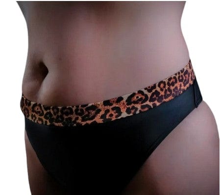 Black bikini bottom with leopard print waistband on a plain background
