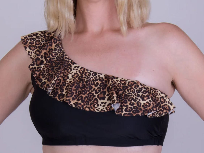 Black mastectomy bikini top with leopard print shoulder detail and pockets for prostheses or breast forms.