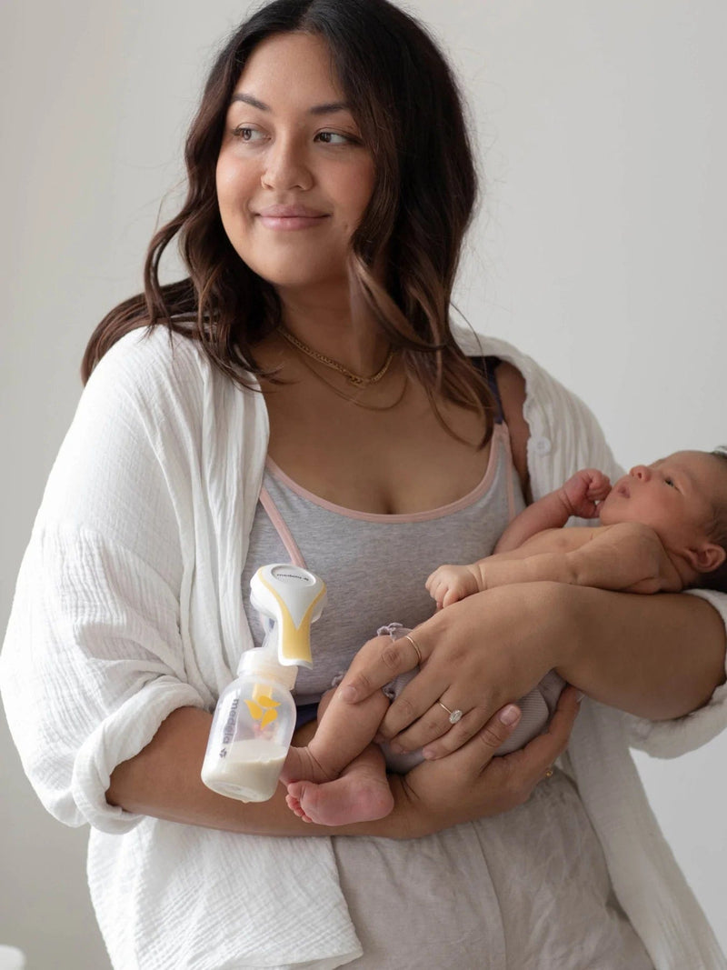 Bravado Clip and Pump Hands-Free Nursing Bra Accessory offers a  revolutionary design that gives moms the convenience, ease and discretion  to pump